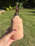 Pink Oil Bottle